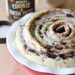 giant spiral cinnamon roll with vanilla maple glaze