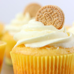 golden oreo cupcakes with whipped cream frosting